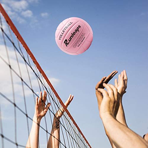 partit de volei, pilota rosa al cel blau, mans i red