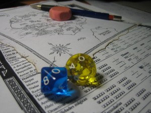tauler de joc amb daus de colors